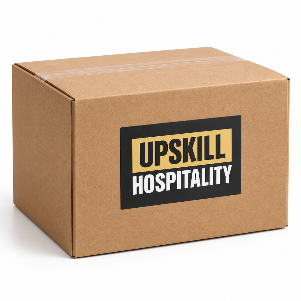 Illustrative packaging mockup of a closed Commis Chef Starter Kit box with an Upskill Hospitality logo sticker